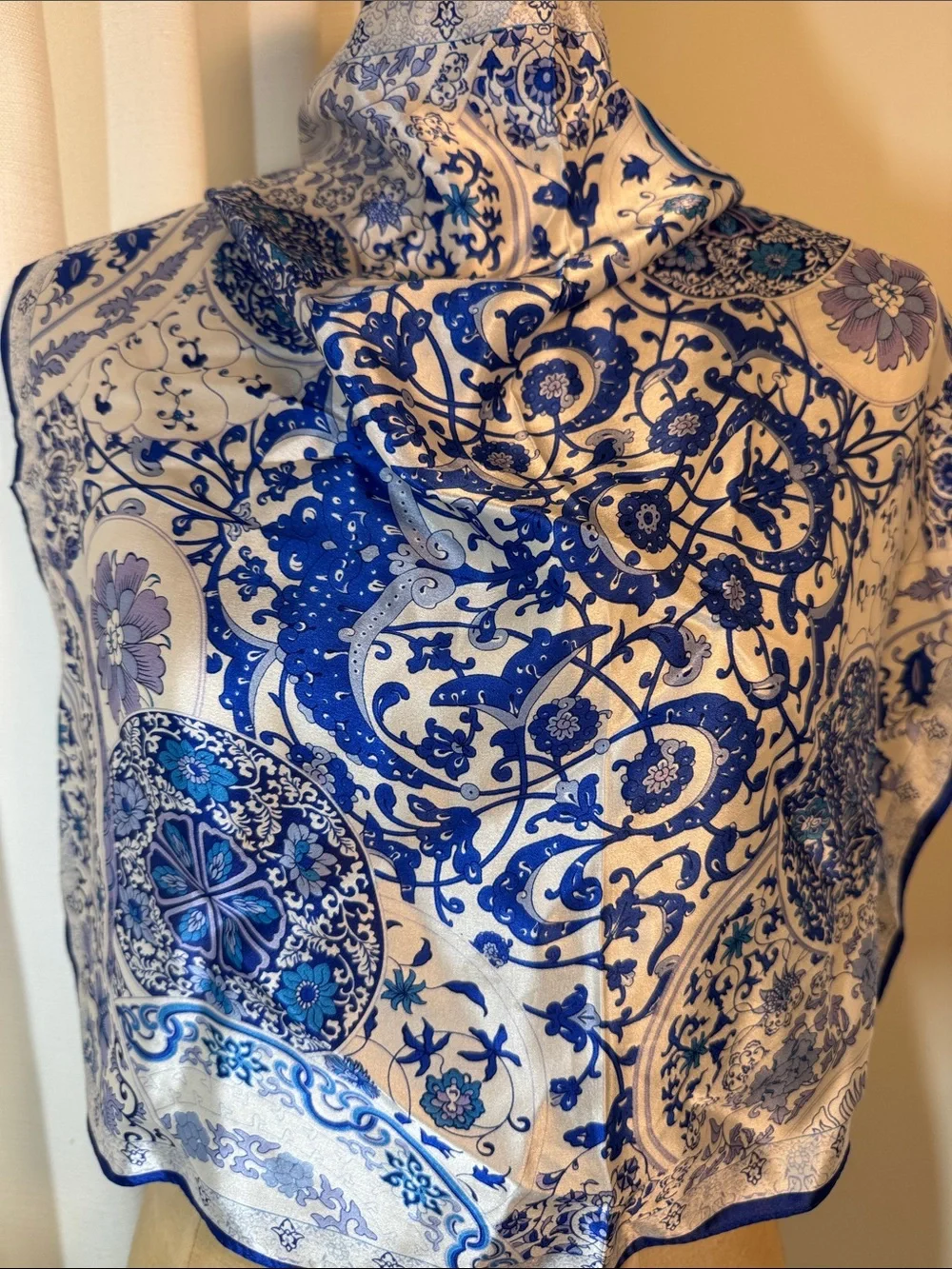 Blue and white patterned silk square scarf.